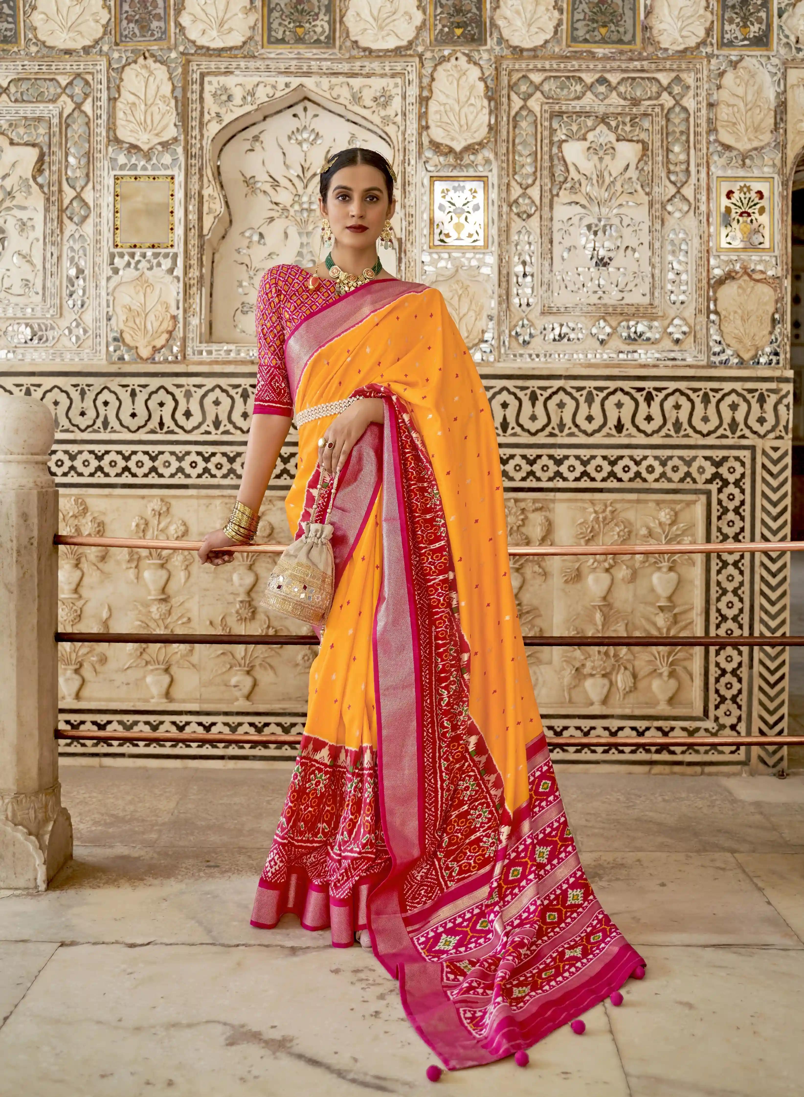 Soft Silk Patola Print Turmeric Yellow Saree With Pink Border