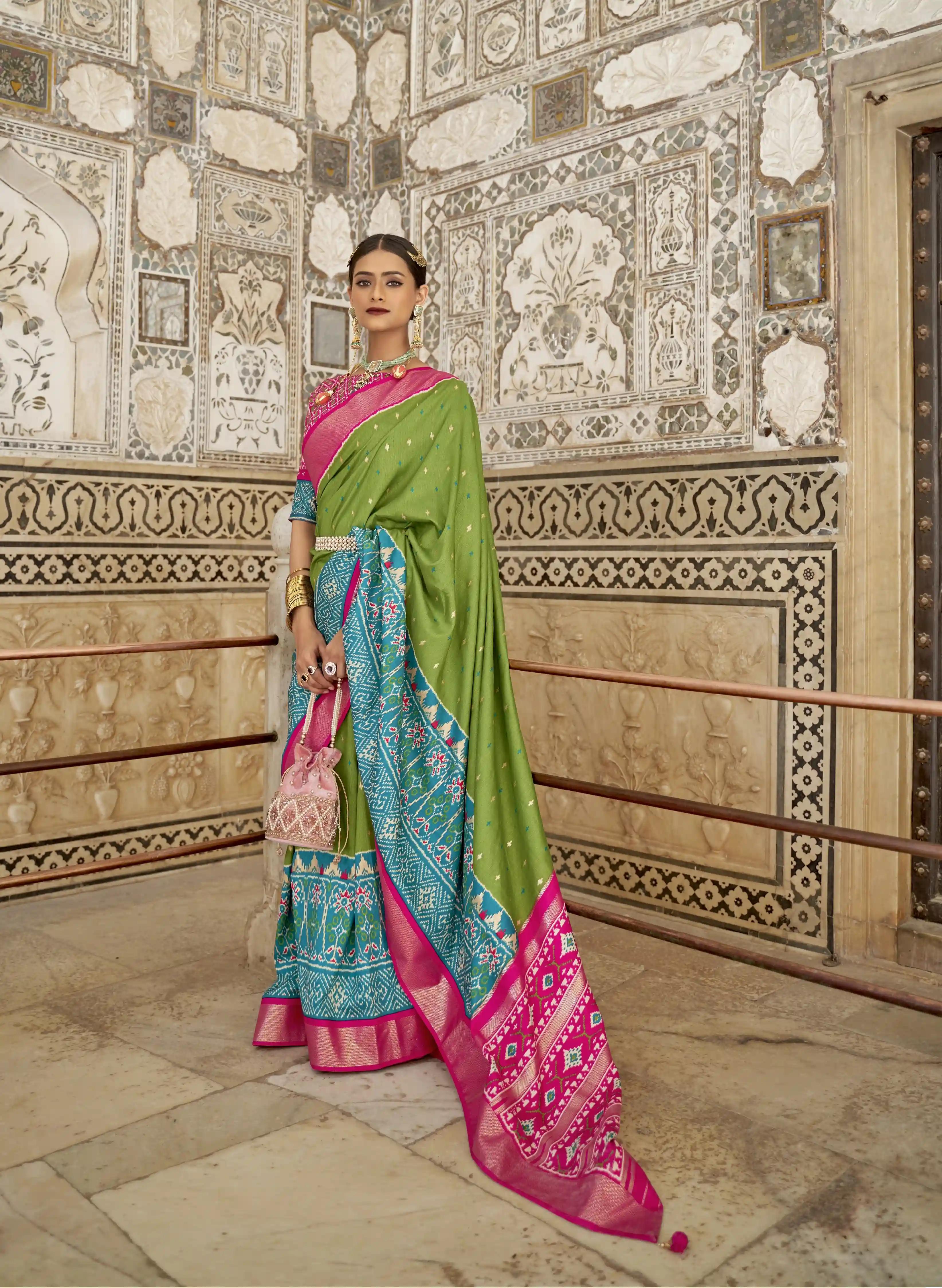 Soft Silk Patola Print Grassy Green Saree With Pink Border