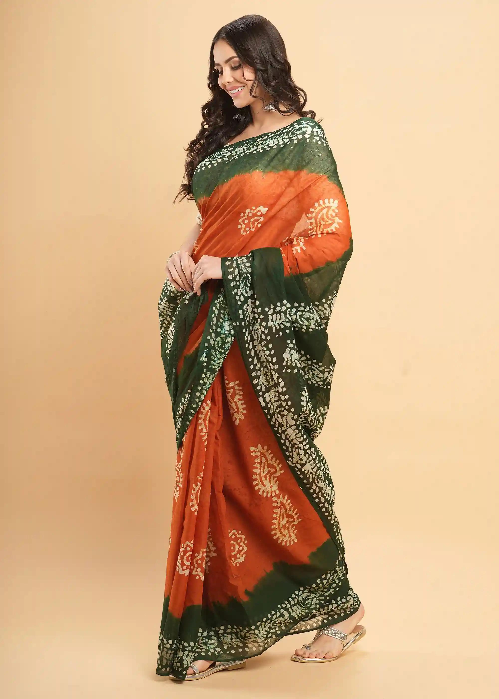 Mul Mul Pure Cotton Saree With Tie N Dye And Batik Prints - Orange & Green